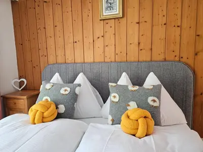 Ein Bett oder Betten in einem Zimmer der Unterkunft Apartment Klein Matterhorn - Haus Miranda
