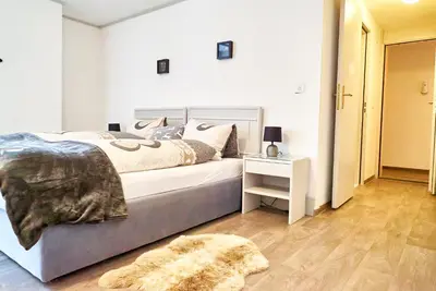 Ein Bett oder Betten in einem Zimmer der Unterkunft Tripple Room with Bathroom.