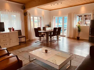Ein Sitzbereich in der Unterkunft Al Porto Fantastic Lake & Mountain View Apartment