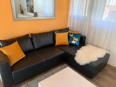Ein Sitzbereich in der Unterkunft Al Porto Fantastic Lake & Mountain View Apartment