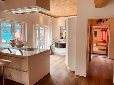 Ein Sitzbereich in der Unterkunft Al Porto Fantastic Lake & Mountain View Apartment