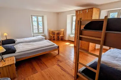 Ein Bett oder Betten in einem Zimmer der Unterkunft Wild Valley Palm Terrace in Valle Onsernone
