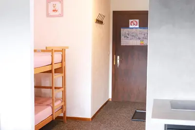 Ein Bett oder Betten in einem Zimmer der Unterkunft Cosy studio for 4 near ski lift, HAMEAU C13