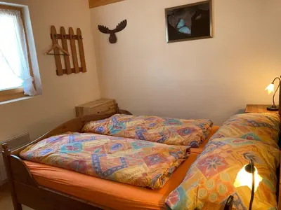 Ein Bett oder Betten in einem Zimmer der Unterkunft Chalet Lalula