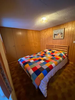 Ein Bett oder Betten in einem Zimmer der Unterkunft Chalet del Sole