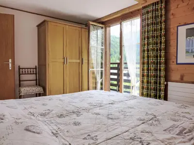 Ein Bett oder Betten in einem Zimmer der Unterkunft Apartment Chalet Kibou by Interhome