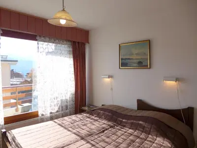 Ein Bett oder Betten in einem Zimmer der Unterkunft Apartment Rond-Point 27 by Interhome