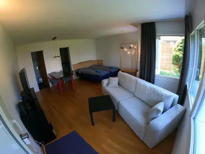 Ein Sitzbereich in der Unterkunft Apartment Chilis Ferienresidenz by Interhome