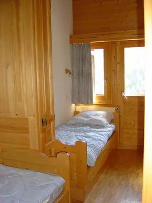 Ein Bett oder Betten in einem Zimmer der Unterkunft Résidence Tarcianne