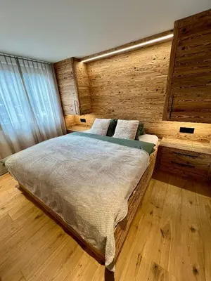 Ein Bett oder Betten in einem Zimmer der Unterkunft Chalet Spatz Garden near Oeschinen Lake with Sauna access