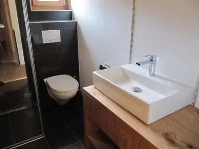 Ein Badezimmer in der Unterkunft Swissalpschalet 4-5 Check also our new home Swissalpschalet 6 PRO