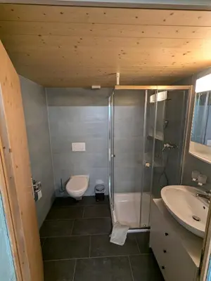 Ein Badezimmer in der Unterkunft Zimmer in Adelboden