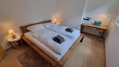 Ein Bett oder Betten in einem Zimmer der Unterkunft Apartment ZerMo