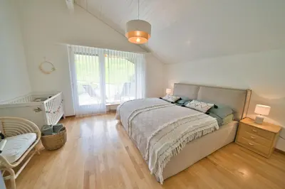 Ein Bett oder Betten in einem Zimmer der Unterkunft Dreamview Retreat - Breathtaking Lake Views
