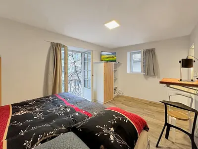 Ein Bett oder Betten in einem Zimmer der Unterkunft Studio 505 - Sion Old City - Swiss Alps