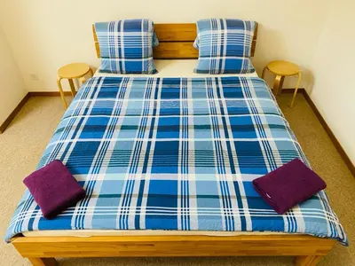 Ein Bett oder Betten in einem Zimmer der Unterkunft Mountain Majesty Residences