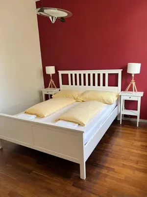 Ein Bett oder Betten in einem Zimmer der Unterkunft APARTMENT PETER