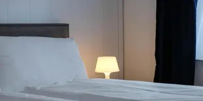 Ein Bett oder Betten in einem Zimmer der Unterkunft Mariposa Spiez