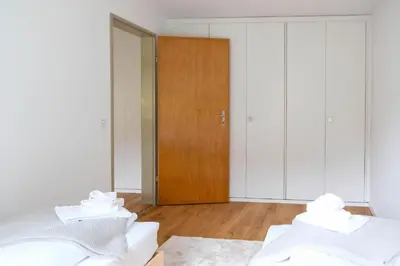 Ein Bett oder Betten in einem Zimmer der Unterkunft Mariposa Spiez
