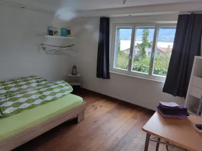 Ein Bett oder Betten in einem Zimmer der Unterkunft Jasmins Airbnb