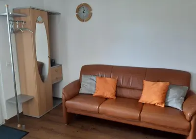 Ein Sitzbereich in der Unterkunft Wohnung Bergruh