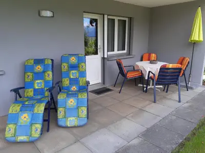 Ein Sitzbereich in der Unterkunft Wohnung Bergruh
