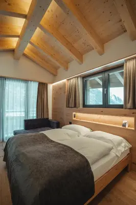 Ein Bett oder Betten in einem Zimmer der Unterkunft Hotel Porta Cervino