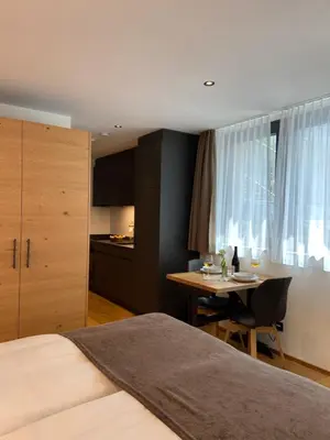 Ein Bett oder Betten in einem Zimmer der Unterkunft Hotel Porta Cervino