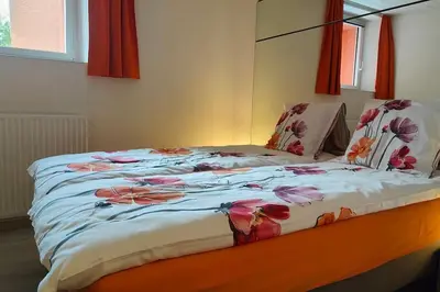 Ein Bett oder Betten in einem Zimmer der Unterkunft Logement Premium à Salins