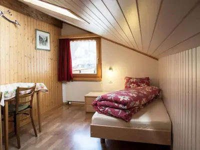 Ein Bett oder Betten in einem Zimmer der Unterkunft Apartment Wiedersehen by Interhome