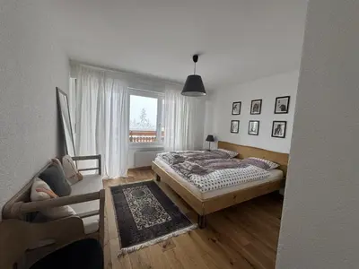 Ein Bett oder Betten in einem Zimmer der Unterkunft Appartement 4.5 pièces Crans-Montana