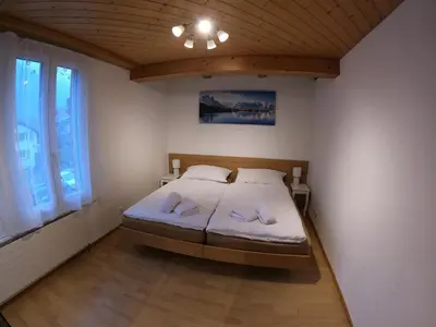 Ein Bett oder Betten in einem Zimmer der Unterkunft Fine&Pine Center Apartment