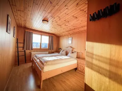 Ein Bett oder Betten in einem Zimmer der Unterkunft Chalet Talblick