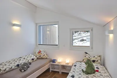 Ein Bett oder Betten in einem Zimmer der Unterkunft Bietschhornblick
