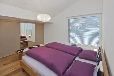 Ein Bett oder Betten in einem Zimmer der Unterkunft Bietschhornblick