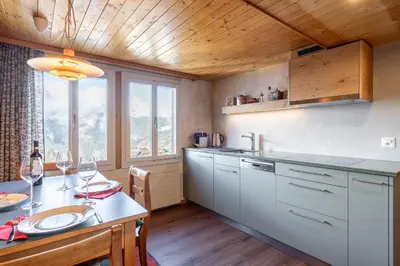 Küche/Küchenzeile in der Unterkunft Chalet Schweizerhof Attic