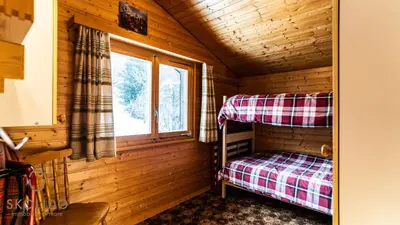 Ein Bett oder Betten in einem Zimmer der Unterkunft Chalet Glück-Auf Bürchen