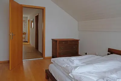 Ein Bett oder Betten in einem Zimmer der Unterkunft Ambiente