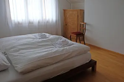 Ein Bett oder Betten in einem Zimmer der Unterkunft Ambiente
