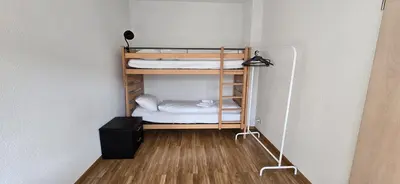 Ein Bett oder Betten in einem Zimmer der Unterkunft House of Thun Full Apartment