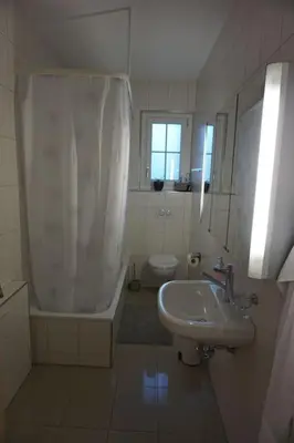 Ein Badezimmer in der Unterkunft House of Thun Full Apartment