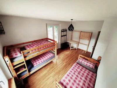 Ein Bett oder Betten in einem Zimmer der Unterkunft House of Thun Full Apartment