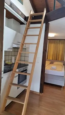 Ein Bett oder Betten in einem Zimmer der Unterkunft Studio 112 - Riverside