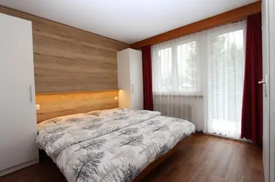 Ein Bett oder Betten in einem Zimmer der Unterkunft Haus Primavera