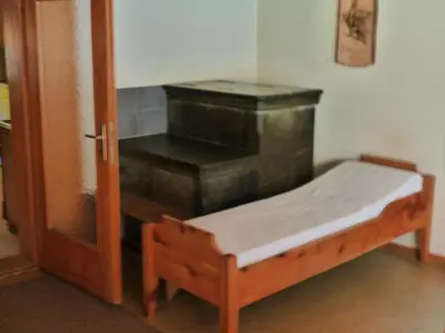 Ein Bett oder Betten in einem Zimmer der Unterkunft Ferienwohnung Berner Oberland - Guttannen