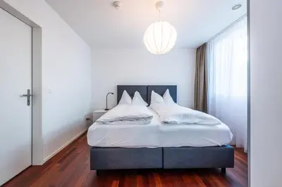 Ein Bett oder Betten in einem Zimmer der Unterkunft Ferienwohnung Attika