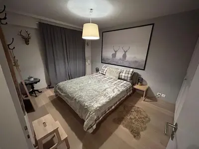 Ein Bett oder Betten in einem Zimmer der Unterkunft A 2 min. à pied du centre de Crans et des remontée