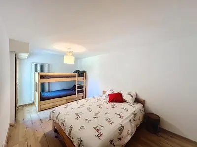 Ein Bett oder Betten in einem Zimmer der Unterkunft Réséda