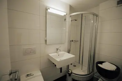 Ein Badezimmer in der Unterkunft Haus Montanara
