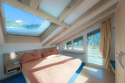 Ein Bett oder Betten in einem Zimmer der Unterkunft Haus Maryland